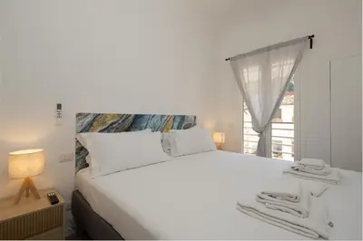 Letto o letti in una camera di Serristori Riverside Apartment