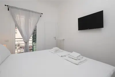 Letto o letti in una camera di Serristori Riverside Apartment