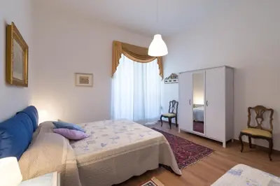 Letto o letti in una camera di Leopolda Dream Home