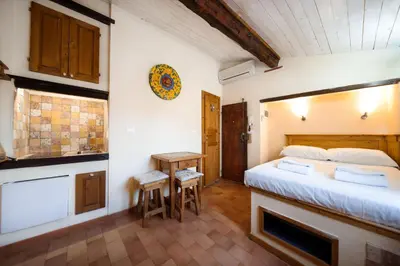 Letto o letti in una camera di Nido Tornabuoni by MMega