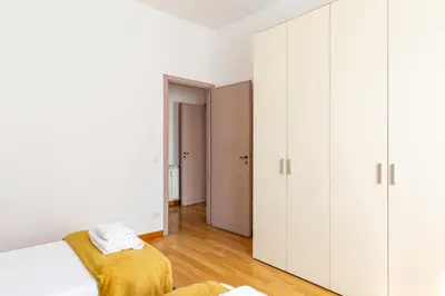 Letto o letti in una camera di GuestHost - Ponte Vecchio Charming Apartments