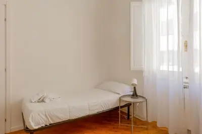 Letto o letti in una camera di GuestHost - Ponte Vecchio Charming Apartments
