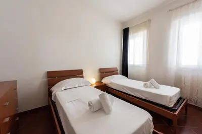 Letto o letti in una camera di San Frediano Lidia's home