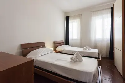 Letto o letti in una camera di San Frediano Lidia's home