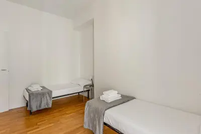 Letto o letti in una camera di GuestHost - Ponte Vecchio Roomy Apartment