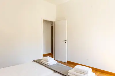 Letto o letti in una camera di GuestHost - Ponte Vecchio Roomy Apartment