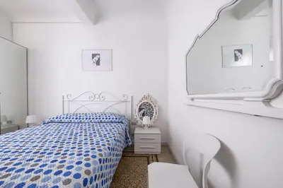 Letto o letti in una camera di Meraviglia