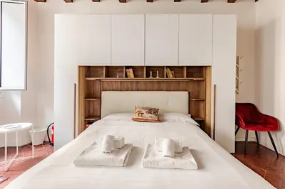 Letto o letti in una camera di Santa Croce 5 Star Suite
