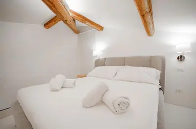 Letto o letti in una camera di Pure Living