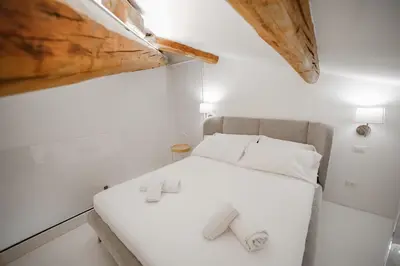 Letto o letti in una camera di Pure Living