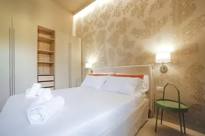 Letto o letti in una camera di Sand Living