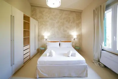 Letto o letti in una camera di Sand Living