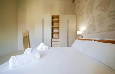 Letto o letti in una camera di Sand Living