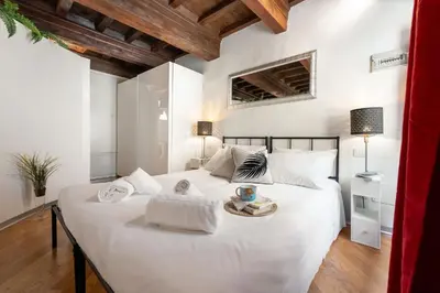 Letto o letti in una camera di Keys of Italy - Rustici 3 - Charming 1BR Loft
