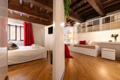 Letto o letti in una camera di Keys of Italy - Rustici 3 - Charming 1BR Loft