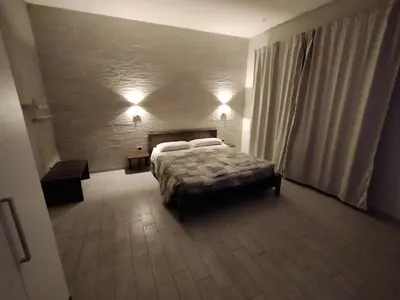 Letto o letti in una camera di Anda e Rianda