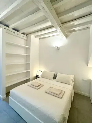 Letto o letti in una camera di Casa Rebecca al Duomo