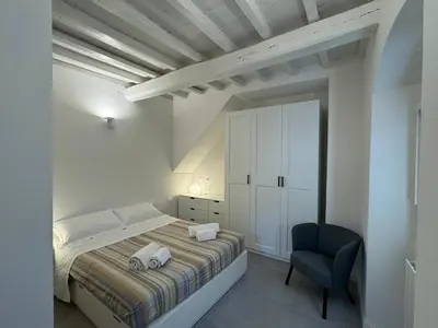 Letto o letti in una camera di Casa Rebecca al Duomo