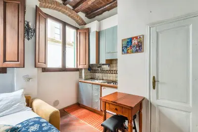 Letto o letti in una camera di Central and comfortable studio in Florence