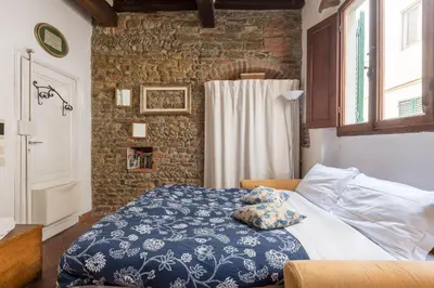 Letto o letti in una camera di Central and comfortable studio in Florence