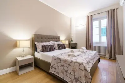 Letto o letti in una camera di Il Giglio Nascosto By San Firenze Collection