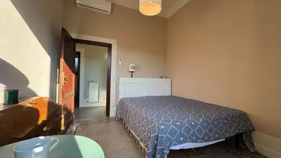 Letto o letti in una camera di San Frediano Sunset Apartment