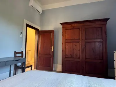 Letto o letti in una camera di San Frediano Sunset Apartment