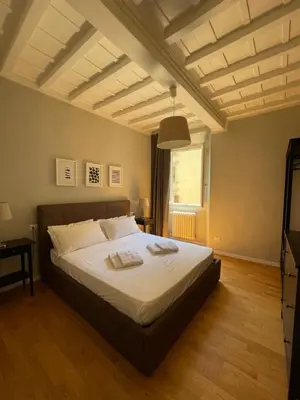 Letto o letti in una camera di La casa di Dante