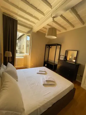 Letto o letti in una camera di La casa di Dante
