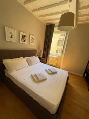 Letto o letti in una camera di La casa di Dante