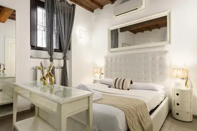 Letto o letti in una camera di Rustic Florentine Dimora