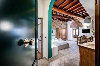 Letto o letti in una camera di Modern Suite in Florence