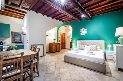 Letto o letti in una camera di Modern Suite in Florence