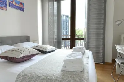 Letto o letti in una camera di Belfiore Apartments near the tramway