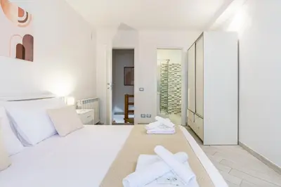 Letto o letti in una camera di Ganga House - Mini Loft Moderno-Free Parking