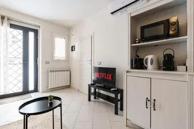 Cucina o angolo cottura di Ganga House - Mini Loft Moderno-Free Parking