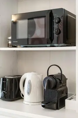Cucina o angolo cottura di Ganga House - Mini Loft Moderno-Free Parking
