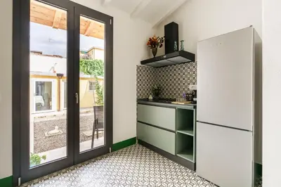 Cucina o angolo cottura di B&B Spezieria By San Firenze Collection