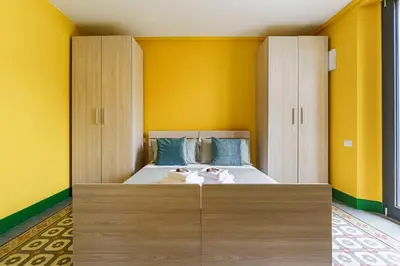 Letto o letti in una camera di B&B Spezieria By San Firenze Collection