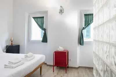 Letto o letti in una camera di UNYCA - Florence Comfort Loft