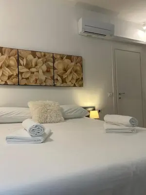Letto o letti in una camera di Residenza Donatello 35