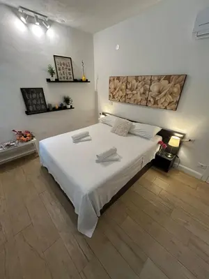 Letto o letti in una camera di Residenza Donatello 35