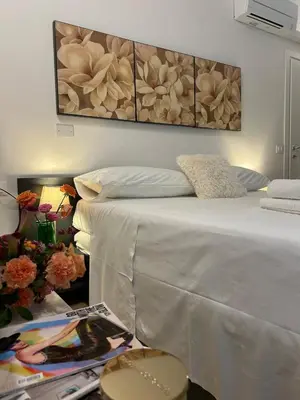Letto o letti in una camera di Residenza Donatello 35