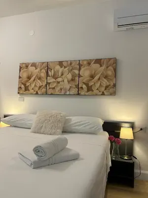 Letto o letti in una camera di Residenza Donatello 35