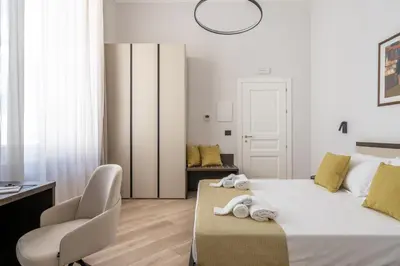 Letto o letti in una camera di Domus Mea Suite