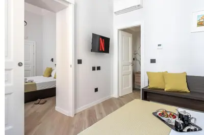 Letto o letti in una camera di Domus Mea Suite