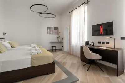TV o dispositivi per l'intrattenimento presso Domus Mea Suite