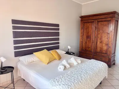 Letto o letti in una camera di Vita Nova