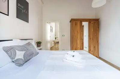 Letto o letti in una camera di Pisana Apartment By San Firenze Collection