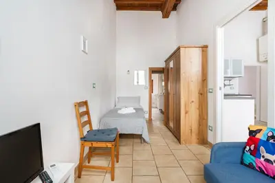 Cucina o angolo cottura di Pisana Apartment By San Firenze Collection